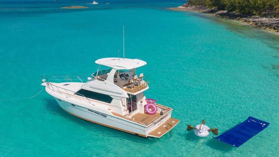 The beautiful, crystal clear blue waters in the Bahamas on your private yacht